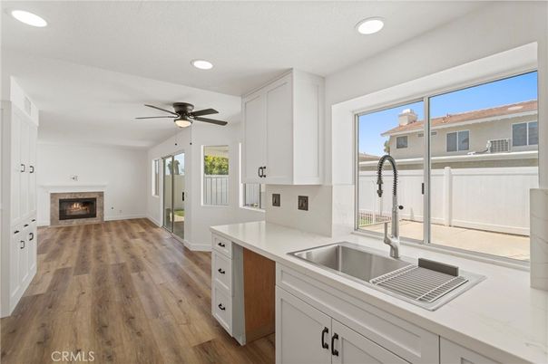 Fireplace, Interior, Kitchen, Recessed Lighting, Wood Texture Flooring