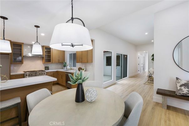 Dining room, Interior, Kitchen, Pendant Lights, Recessed Lighting, Stainless Steel Appliances, Wood Texture Flooring