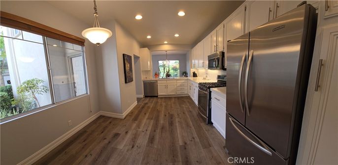 Interior, Kitchen, Pendant Lights, Recessed Lighting, Stainless Steel Appliances, Wood Texture Flooring