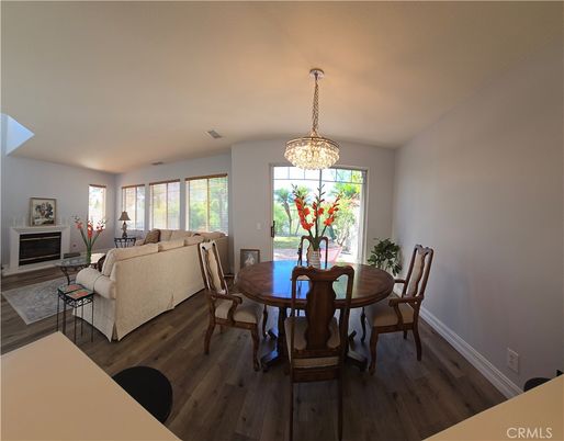 Chandelier, Dining room, Fireplace, Interior, Living room, Wood Texture Flooring