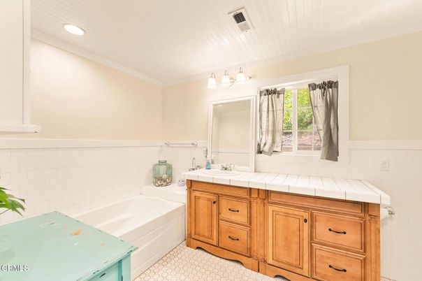 Bathroom, Dual Sink Vanities, Interior, Recessed Lighting, Tile Countertops