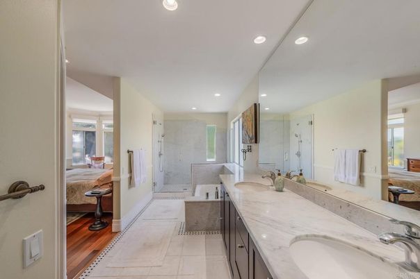 Bathroom, Dual Sink Vanities, Glass Shower, Interior, Recessed Lighting, Wood Texture Flooring