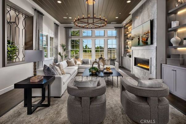 Chandelier, Fireplace, Interior, Living room, Pendant Lights, Recessed Lighting, Wood Texture Flooring