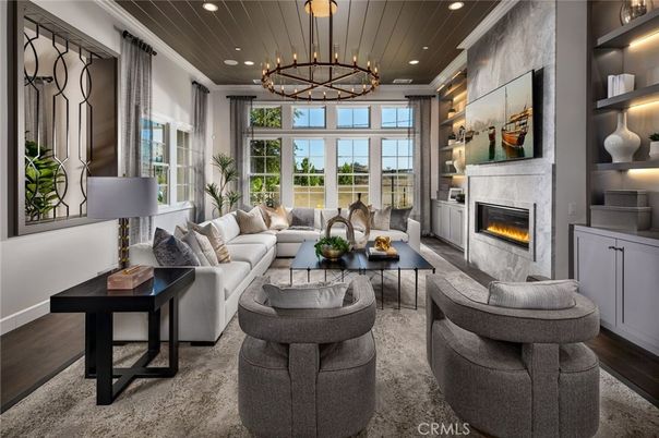 Chandelier, Fireplace, Interior, Living room, Pendant Lights, Recessed Lighting, Wood Texture Flooring