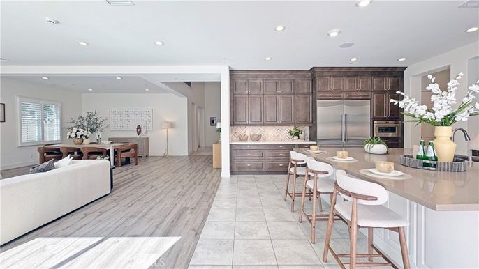 Dining room, Interior, Kitchen, Living room, Recessed Lighting, Stainless Steel Appliances, Wood Texture Flooring