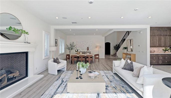Dining room, Fireplace, Interior, Living room, Recessed Lighting, Wood Texture Flooring