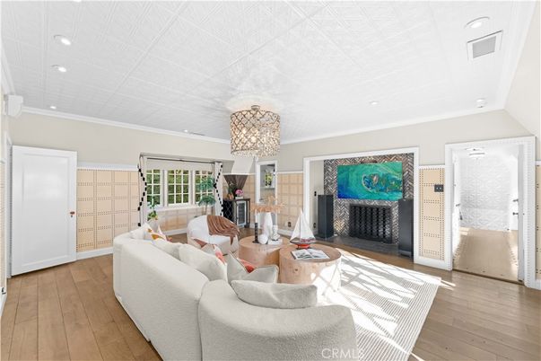 Chandelier, Fireplace, Interior, Living room, Recessed Lighting, Wood Texture Flooring