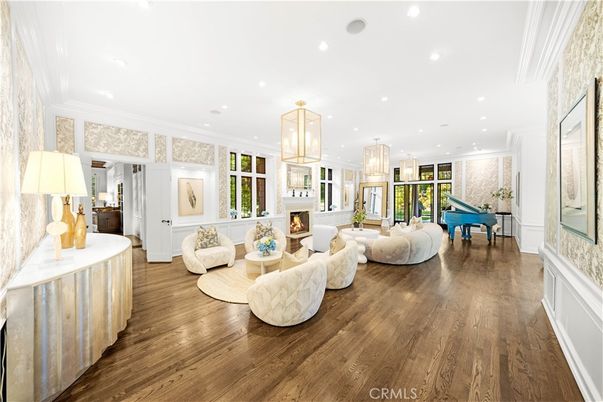 Billiard Table, Fireplace, Game Room, Interior, Living room, Pendant Lights, Recessed Lighting, Wood Texture Flooring