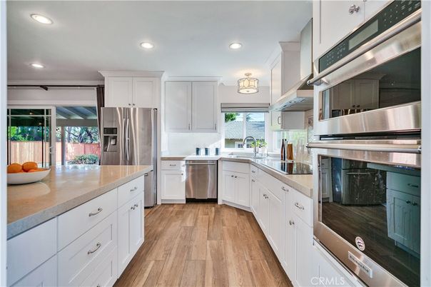 Interior, Kitchen, Recessed Lighting, Stainless Steel Appliances, Wood Texture Flooring