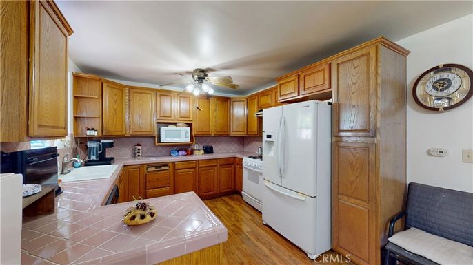 Interior, Kitchen, Tile Countertops, Wood Texture Flooring