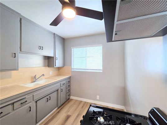 Interior, Kitchen, Tile Countertops, Wood Texture Flooring