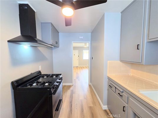 Interior, Kitchen, Tile Countertops, Wood Texture Flooring