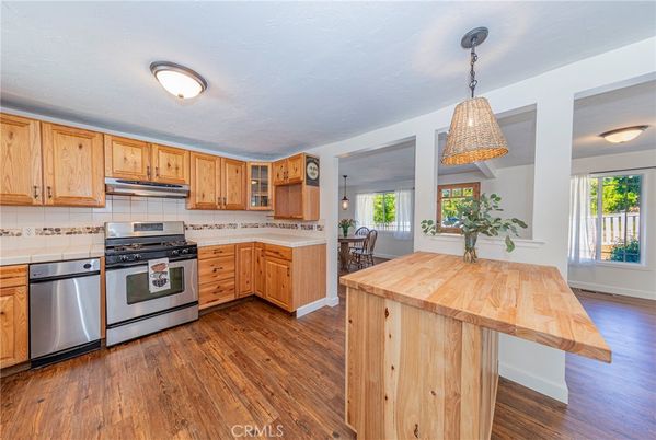 Dining room, Interior, Kitchen, Pendant Lights, Stainless Steel Appliances, Wood Texture Flooring