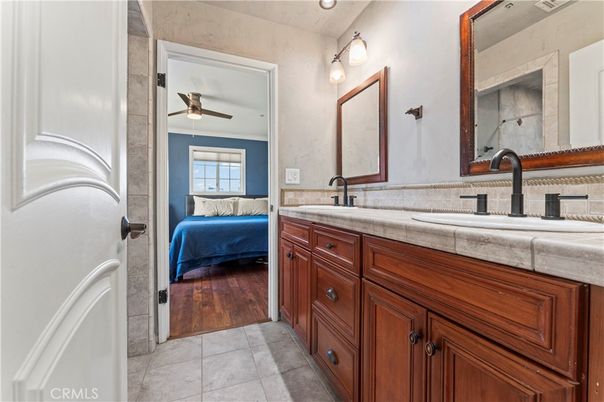 Bathroom, Bedroom, Dual Sink Vanities, Interior, Tile Countertops, Wood Texture Flooring