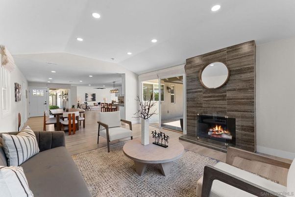 Dining room, Fireplace, Interior, Living room, Pendant Lights, Recessed Lighting, Wood Texture Flooring
