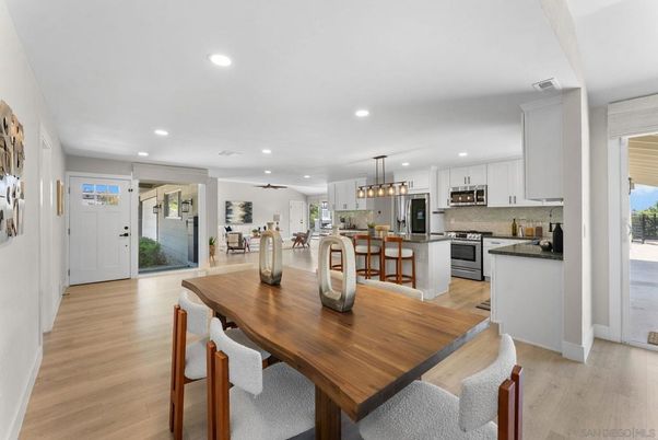 Chandelier, Dining room, Interior, Kitchen, Pendant Lights, Recessed Lighting, Stainless Steel Appliances, Wood Texture Flooring
