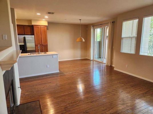 Fireplace, Interior, Kitchen, Pendant Lights, Recessed Lighting, Wood Texture Flooring