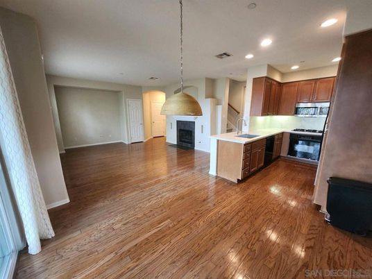 Fireplace, Interior, Kitchen, Pendant Lights, Recessed Lighting, Wood Texture Flooring