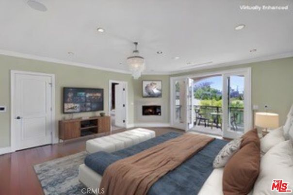 Bedroom, Chandelier, Fireplace, Interior, Recessed Lighting, Wood Texture Flooring