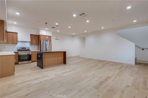 Interior, Kitchen, Pendant Lights, Recessed Lighting, Stainless Steel Appliances, Wood Texture Flooring