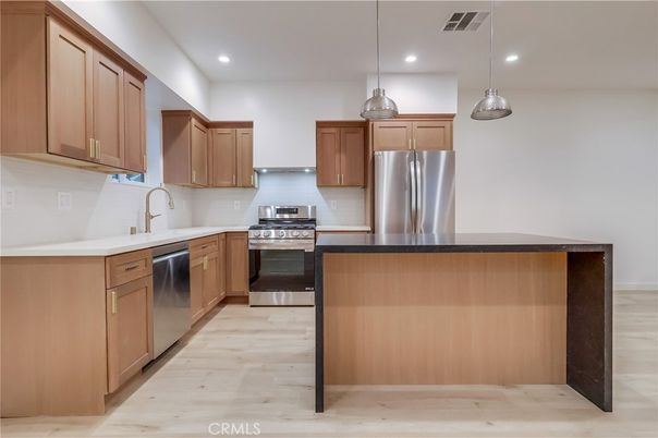 Interior, Kitchen, Pendant Lights, Recessed Lighting, Stainless Steel Appliances, Wood Texture Flooring
