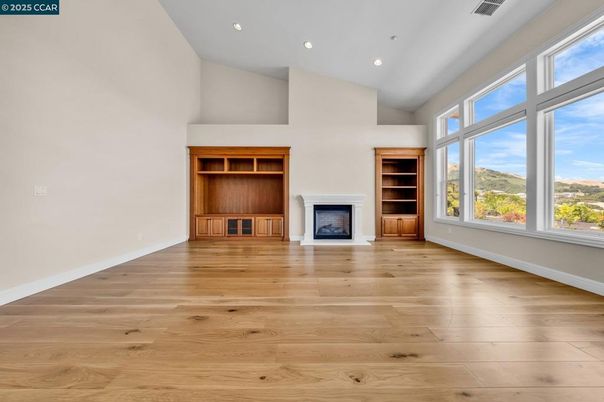 Empty room, Fireplace, Interior, Recessed Lighting, Wood Texture Flooring