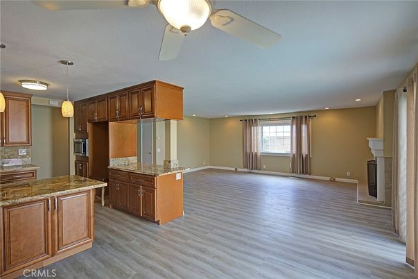 Fireplace, Interior, Kitchen, Pendant Lights, Recessed Lighting, Wood Texture Flooring