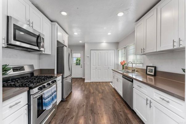 Interior, Kitchen, Recessed Lighting, Stainless Steel Appliances, Wood Texture Flooring