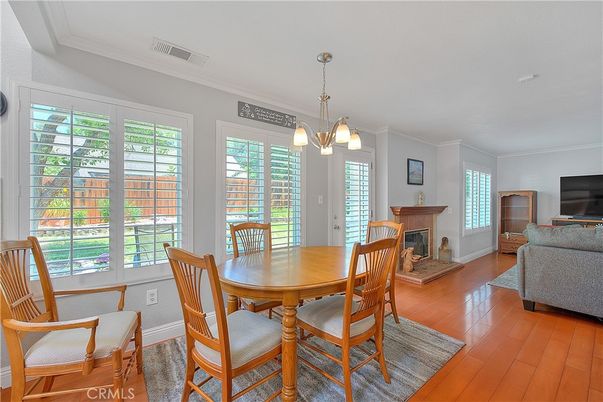Dining room, Fireplace, Interior, Pendant Lights, Wood Texture Flooring