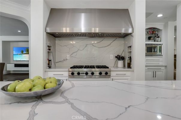 Interior, Kitchen, Marble Walls, Recessed Lighting, Stainless Steel Appliances