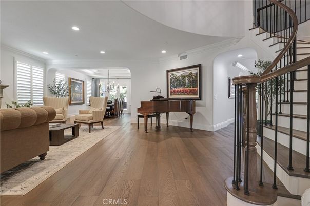 Chandelier, Dining room, Interior, Living room, Piano, Recessed Lighting, Wood Texture Flooring