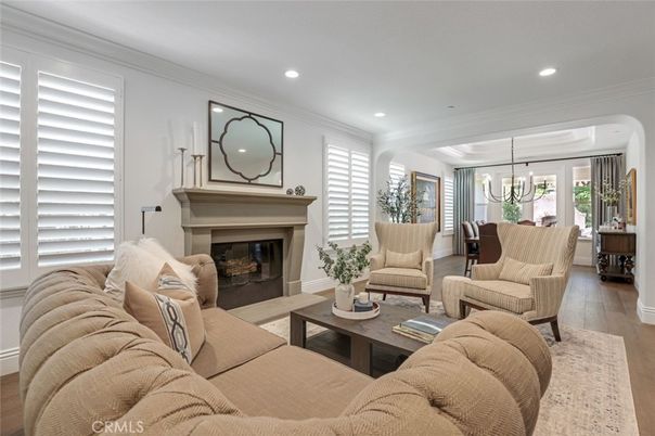 Chandelier, Dining room, Fireplace, Interior, Living room, Recessed Lighting, Wood Texture Flooring