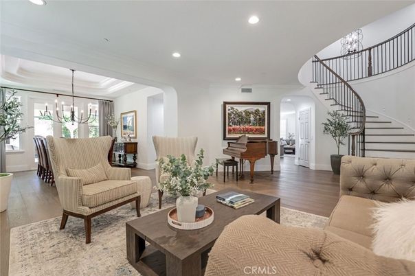 Chandelier, Dining room, Interior, Living room, Piano, Recessed Lighting, Wood Texture Flooring