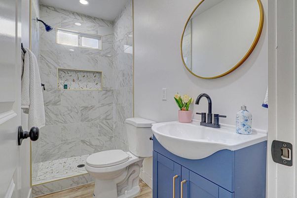 Bathroom, Glass Shower, Interior, Marble Walls, Recessed Lighting, Wood Texture Flooring