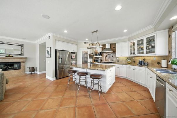 Fireplace, Interior, Kitchen, Pendant Lights, Recessed Lighting, Stainless Steel Appliances