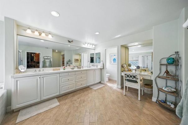 Bathroom, Dual Sink Vanities, Interior, Recessed Lighting, Wood Texture Flooring