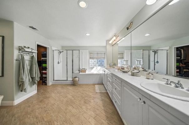 Bathroom, Dual Sink Vanities, Interior, Recessed Lighting, Tile Countertops, Wood Texture Flooring