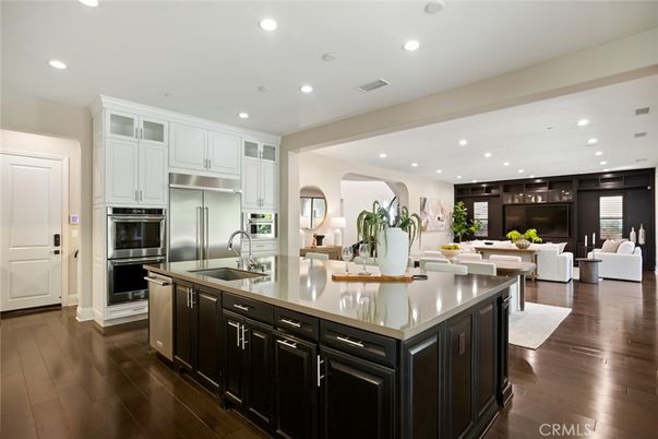 Dining room, Interior, Kitchen, Living room, Recessed Lighting, Stainless Steel Appliances, Wood Texture Flooring