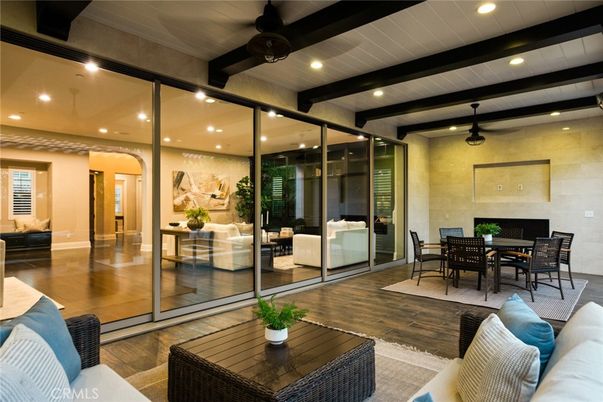 Dining room, Fireplace, Interior, Living room, Recessed Lighting, Wood Texture Flooring