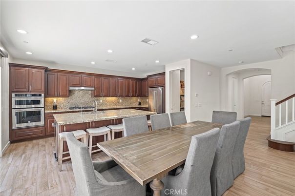 Dining room, Interior, Kitchen, Recessed Lighting, Stainless Steel Appliances, Wood Texture Flooring