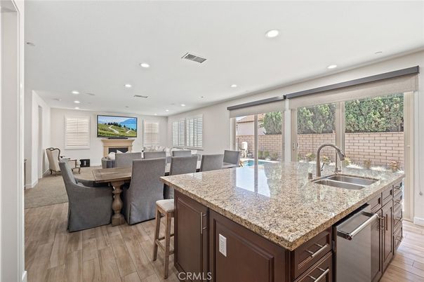 Dining room, Interior, Kitchen, Recessed Lighting, Stainless Steel Appliances, Wood Texture Flooring