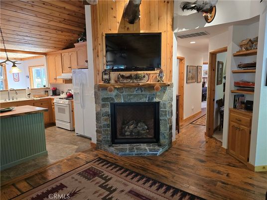 Fireplace, Interior, Kitchen, Recessed Lighting, Wooden Ceilings, Wood Texture Flooring
