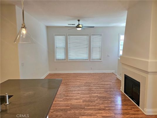 Empty room, Fireplace, Interior, Pendant Lights, Wood Texture Flooring
