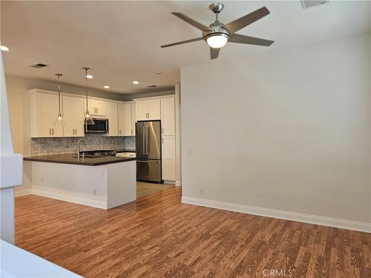 Interior, Kitchen, Pendant Lights, Recessed Lighting, Stainless Steel Appliances, Wood Texture Flooring