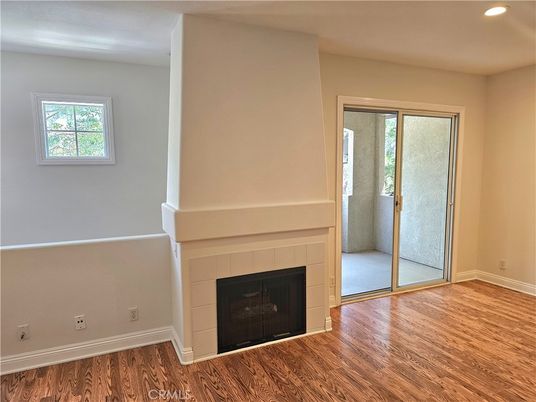 Empty room, Fireplace, Interior, Recessed Lighting, Wood Texture Flooring