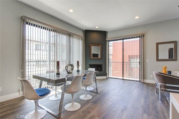 Dining room, Fireplace, Interior, Recessed Lighting, Wood Texture Flooring