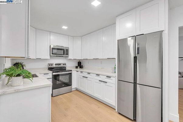 Interior, Kitchen, Recessed Lighting, Stainless Steel Appliances, Wood Texture Flooring