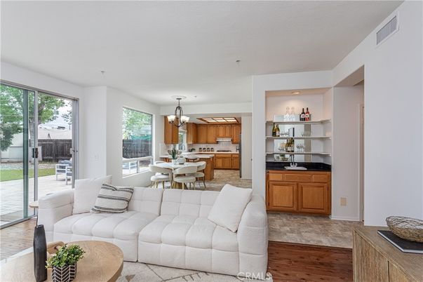 Chandelier, Dining room, Interior, Kitchen, Living room, Pendant Lights, Recessed Lighting, Wood Texture Flooring