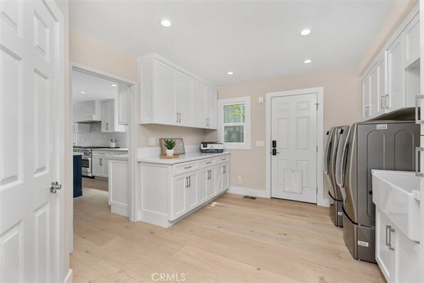 Interior, Kitchen, Recessed Lighting, Washer, Wood Texture Flooring