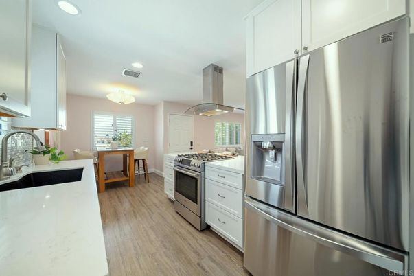 Dining room, Interior, Kitchen, Recessed Lighting, Stainless Steel Appliances, Wood Texture Flooring
